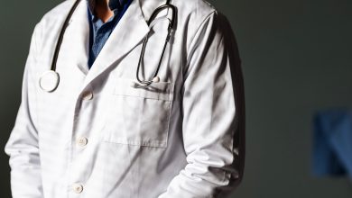 Close up of doctor in coat with stethoscope.
