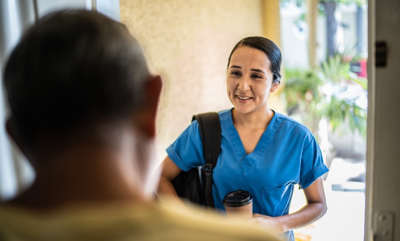 Mid adult nurse arriving at client home